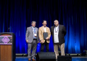 Fred Chong accepting award